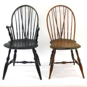 Pair of Rhode Island Brace Back Windsor Chairs by Unknown Artist. Late 18th c. Black painted armchair and natural finish side chair.