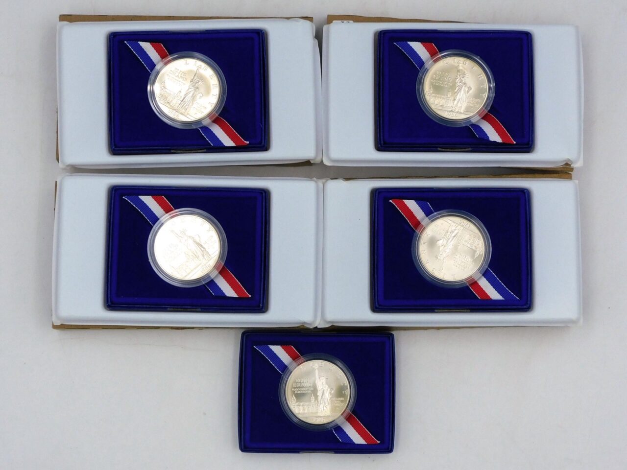 (5) 1986 Ellis Island Silver Dollars