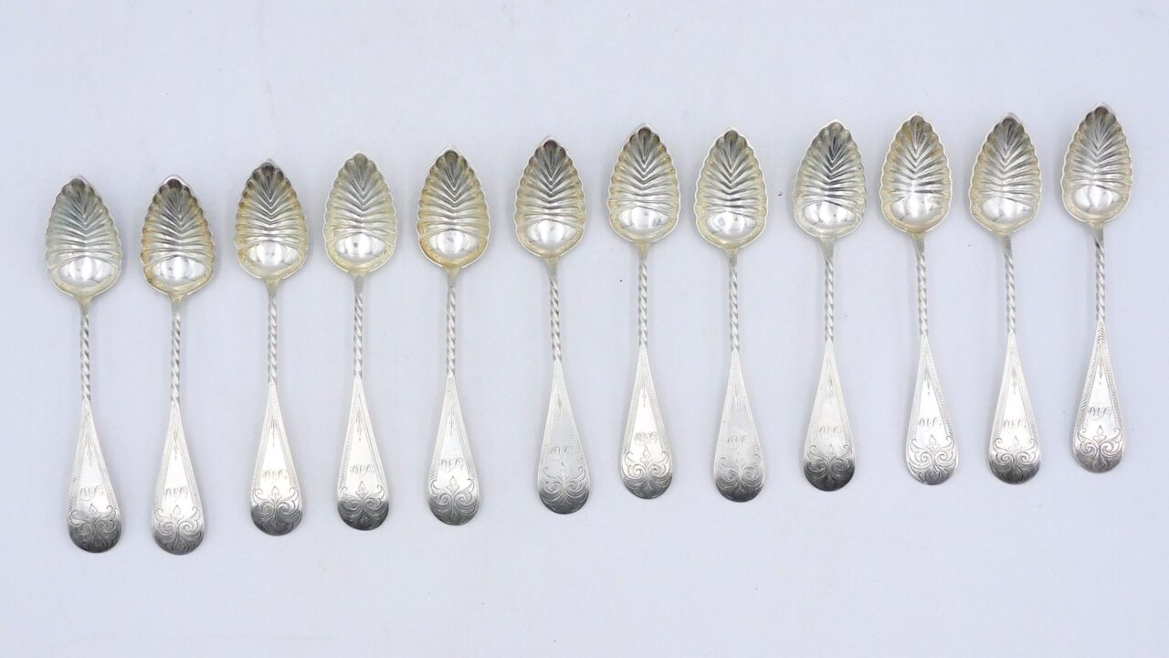 (12) Coin Silver Grapefruit Spoons.